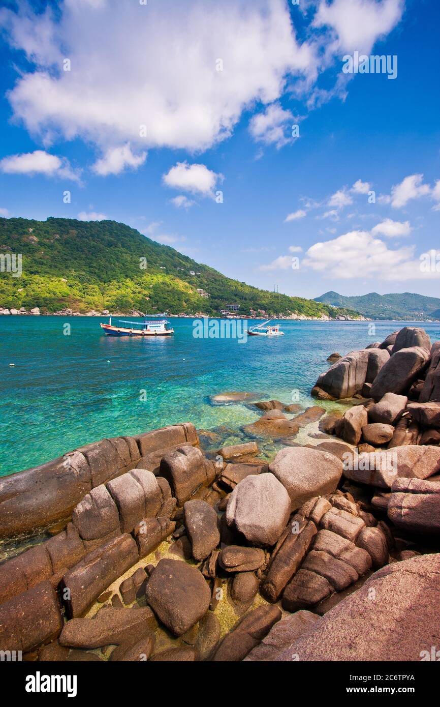 green mountain and beauty rock and turquoise sea water and blue sky is paradise in Koh tao thailand Stock Photo
