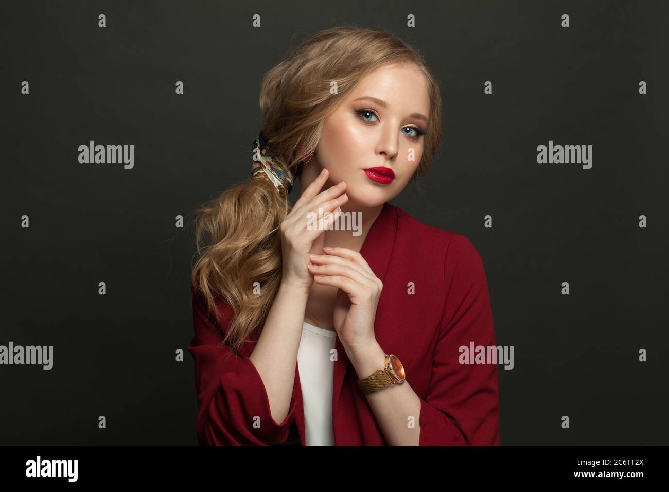 Young woman on black background portrait Stock Photo - Alamy