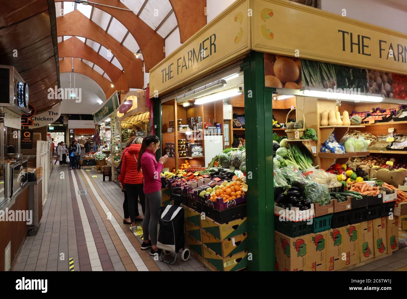 English Market, Cork Ireland, fruit stall with people shopping Stock