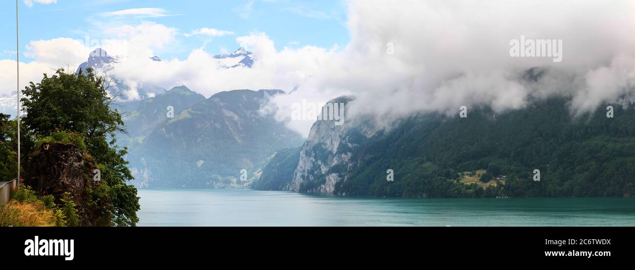 Panoramic View Of Lake Lucerne With Mountains Shrouded In Clouds panoramic-view-of-lake-lucerne-with-mountains-shrouded-in-clouds
