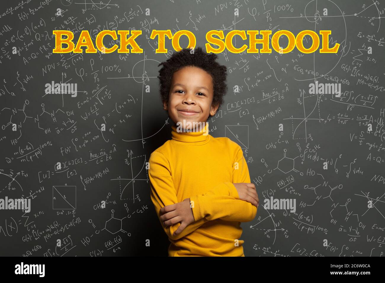 Happy kid student boy on chalkboard background with Back to school ...