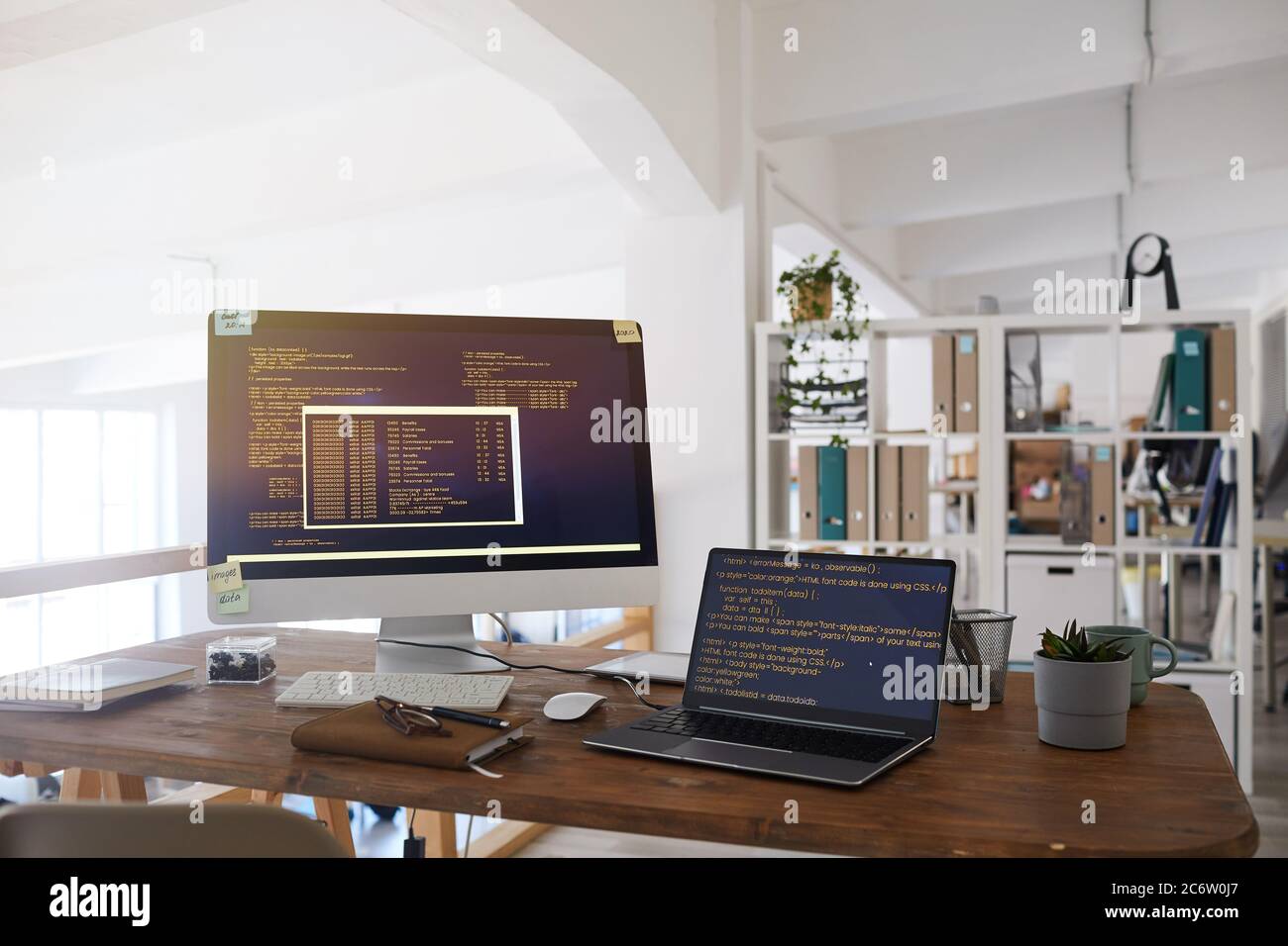 Background image of black and orange programming code on computer ...