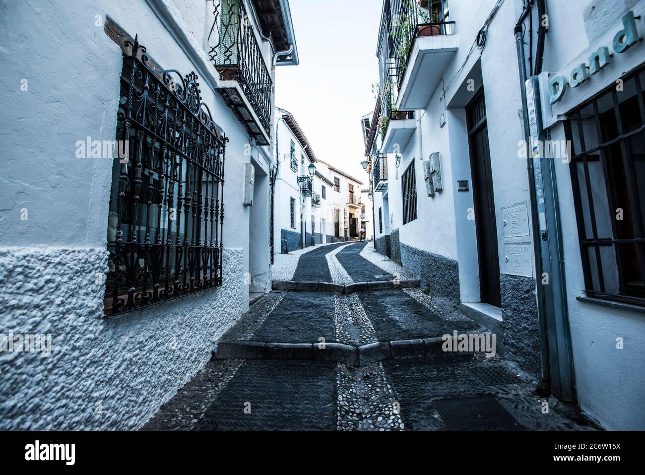 Narrow street in the Albaicin neighborhood Stock Photo
