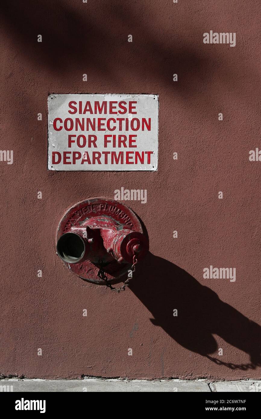 American iron standpipe painted red with red cap and chain. New York ...