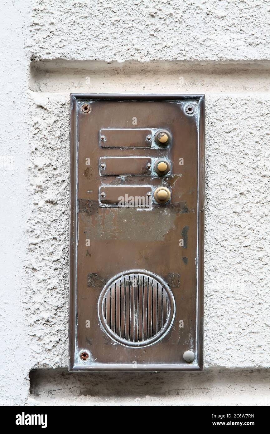 Decorative element. Brass doorbell with nameplates, buttons and