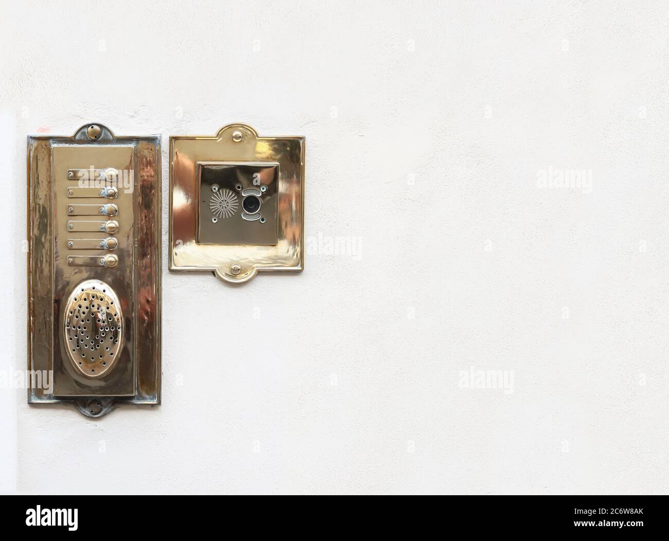 Decorative element. Brass doorbell with nameplates, buttons and