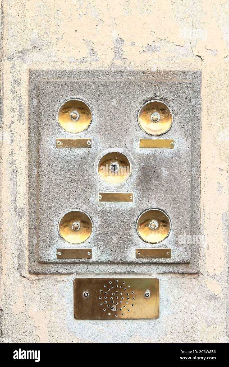 Decorative element. Brass doorbell with nameplates, buttons and