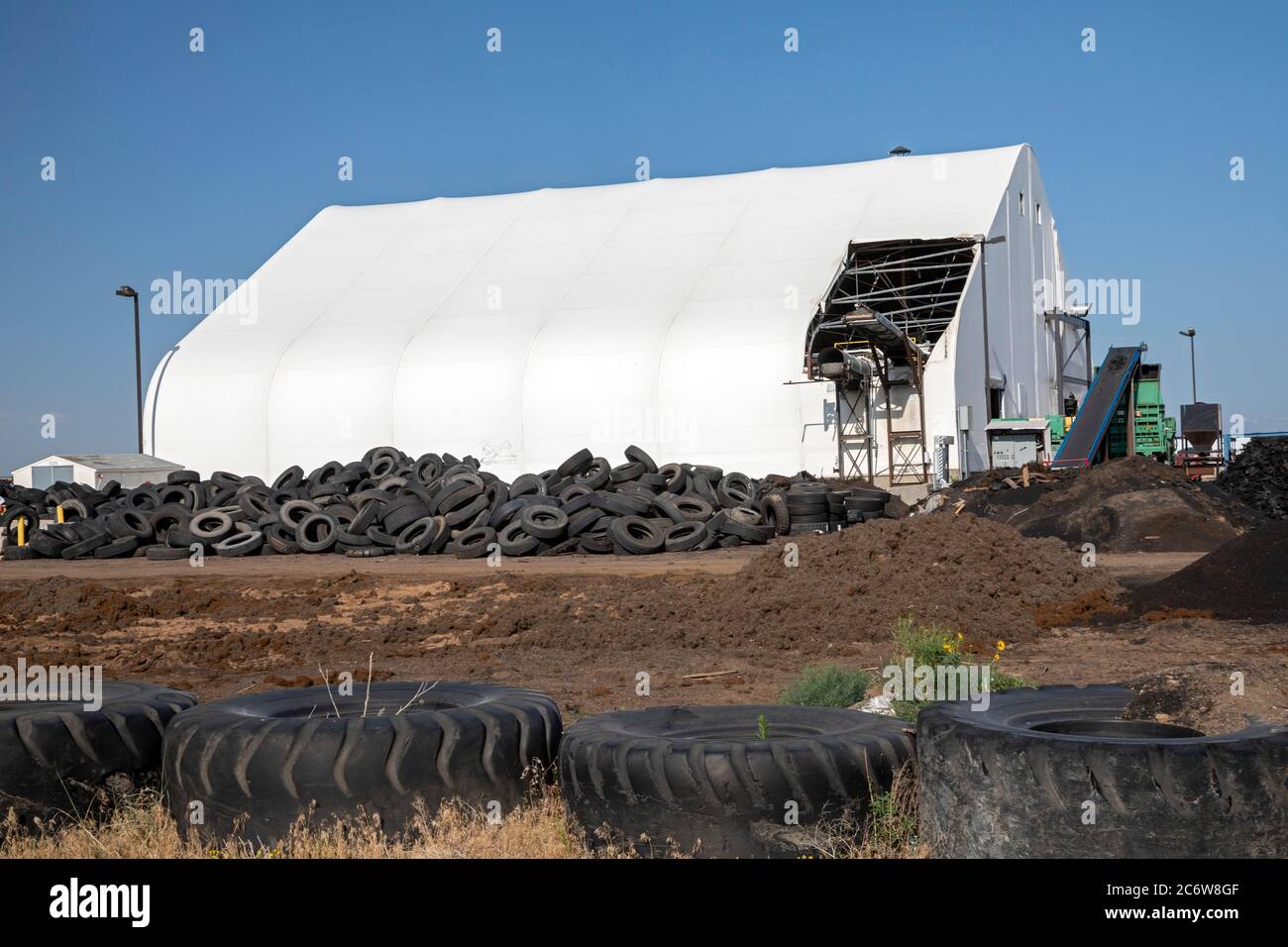 Hudson, Colorado - The CH2E tire recycling center northeast of Denver. The tires are recycled into materials used for a variety of industrial and comm Stock Photo