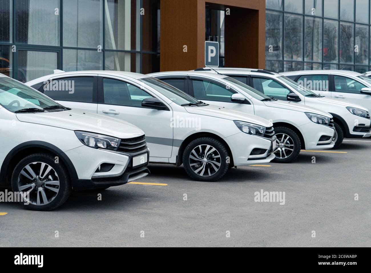 New cars in stock. Automotive industry Stock Photo Alamy