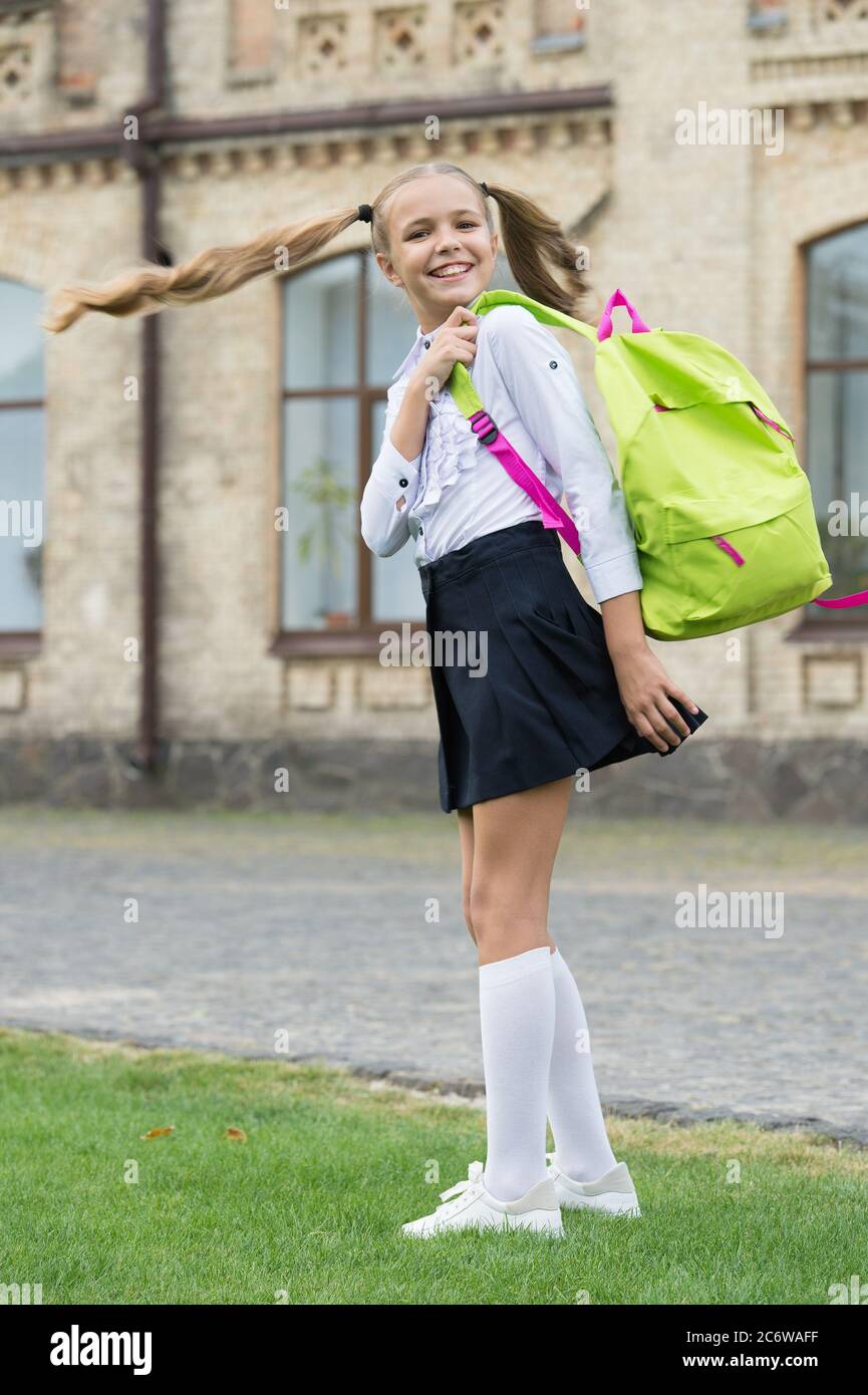 happy childhood. teen girl with backpack. pretty child little girl