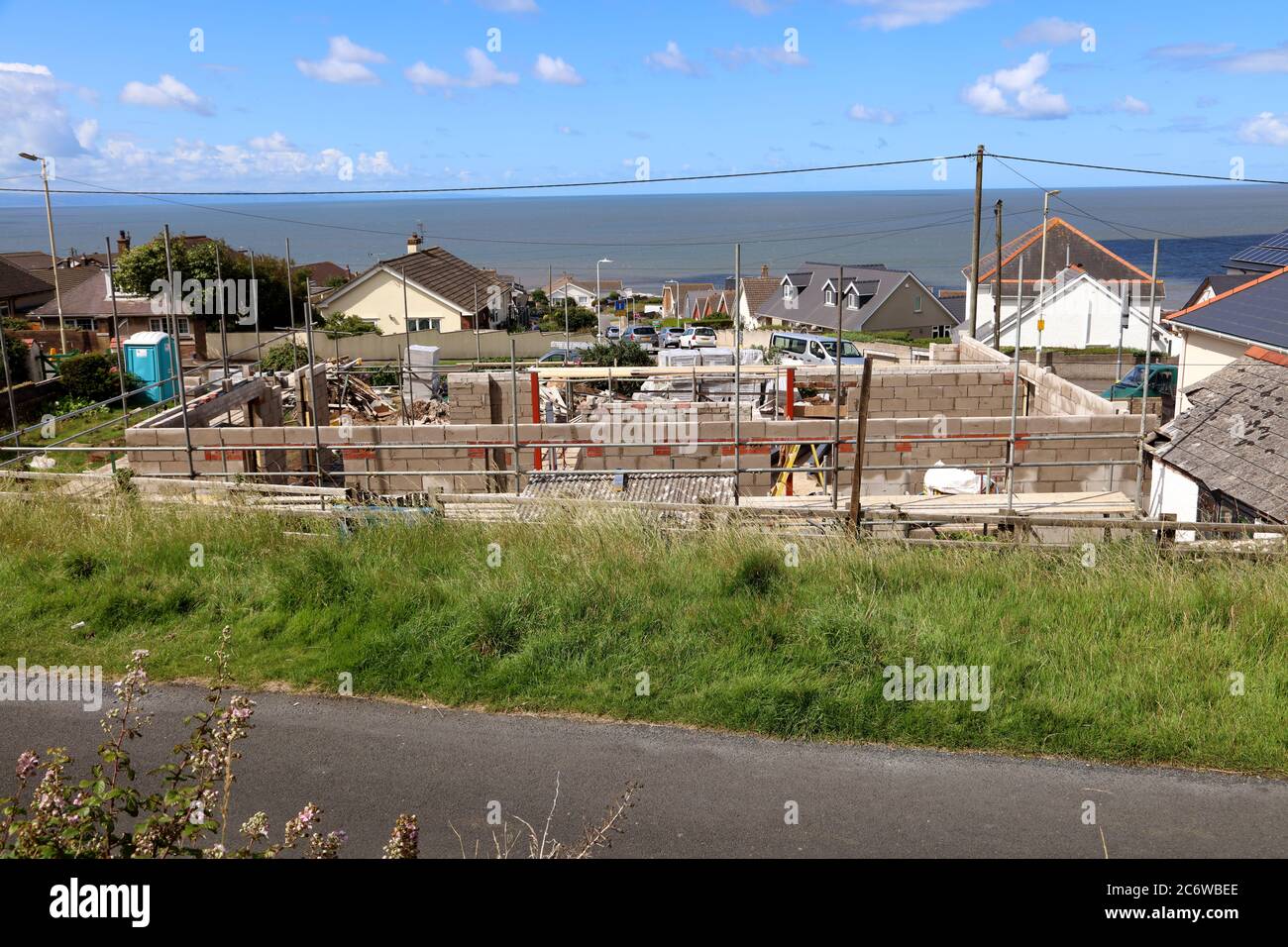 Old house for new house under construction on the main road through Ogmore by sea near Bridgend