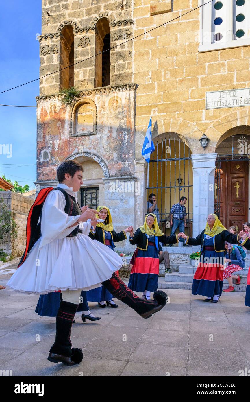 Traditional Greek dancing at a Paniyiri, a local festival celebrating the patron saint of the village church, Proastio, near Kardamili in the outer Ma Stock Photo