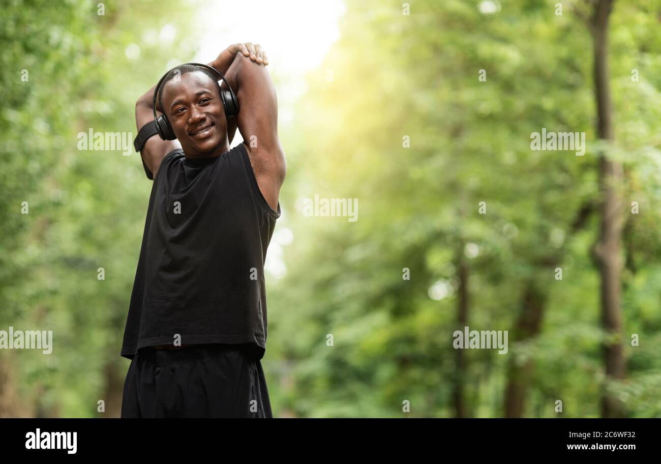 Man runner stretching hi-res stock photography and images - Alamy