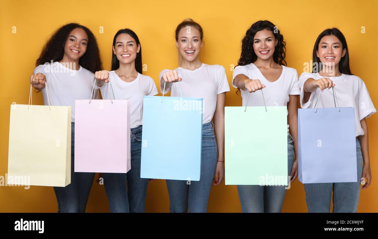 Female Shopper Lifestyle. Women Hobby. Luxury Boutique. Back View Of Rich  Lady Holding Blank Brand Name Mockup Packages. Stock Photo, Picture and  Royalty Free Image. Image 123667874.