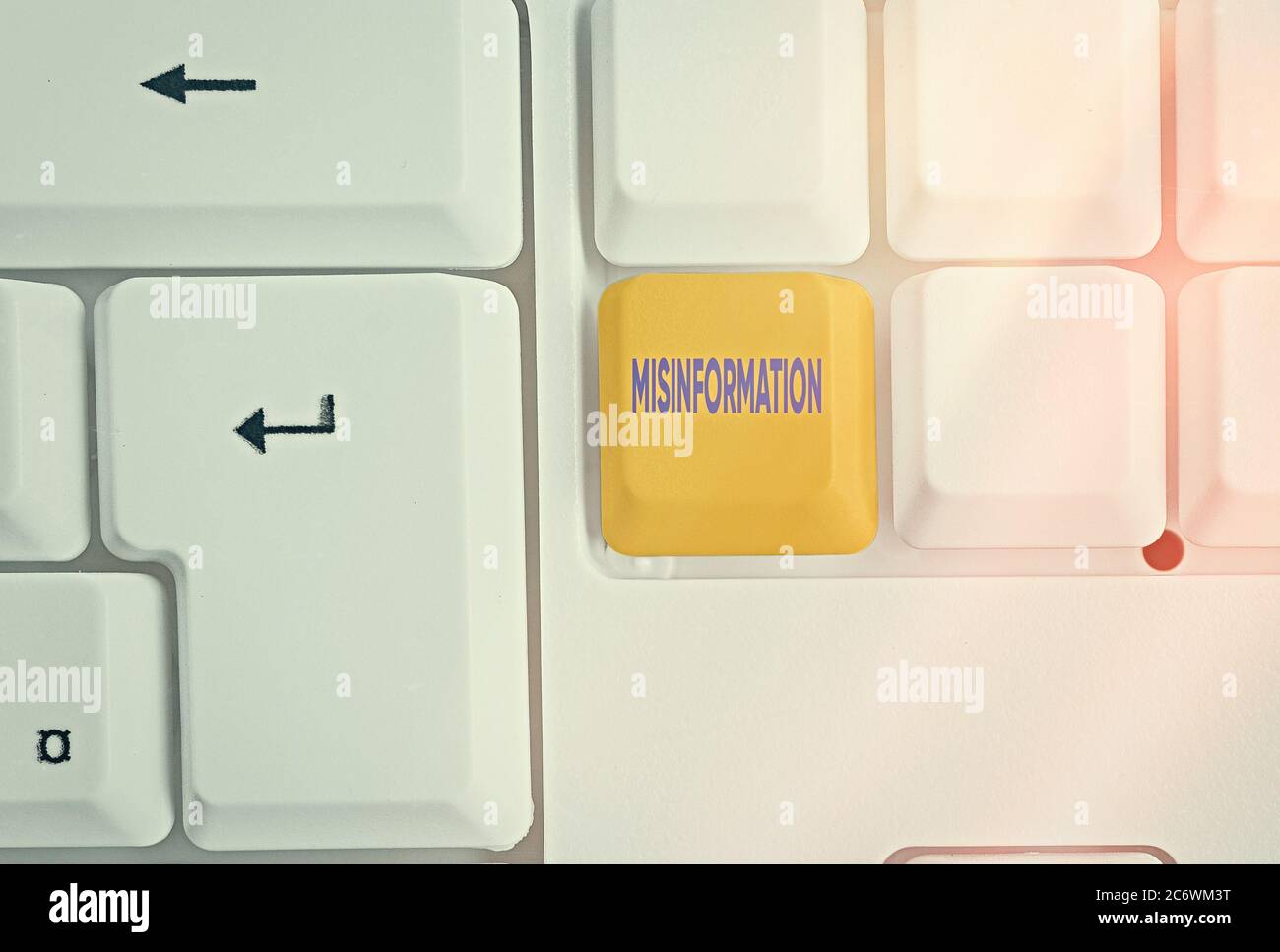 Writing note showing Misinformation. Business concept for false data, in particular, intended intentionally to deceive Colored keyboard key with acces Stock Photo