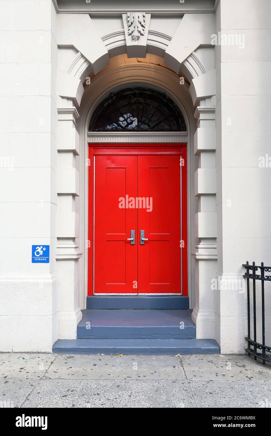 Red doors of P.S. 158 Bayard Taylor School, a Beaux-arts style public school built in the 19th century in the Upper East Side of New York City. Stock Photo