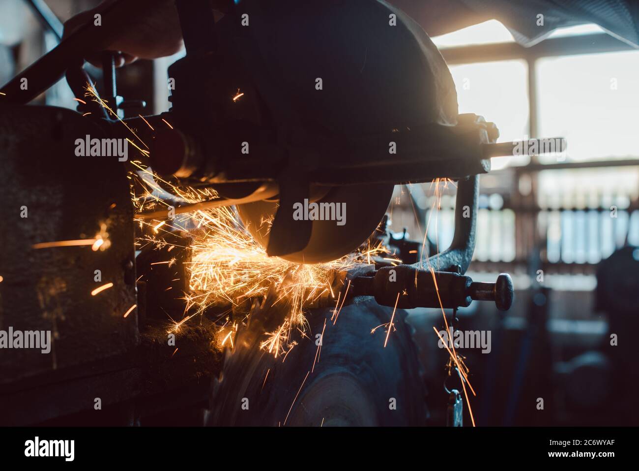 Machine sharpening tools in of a carpentry Stock Photo Alamy