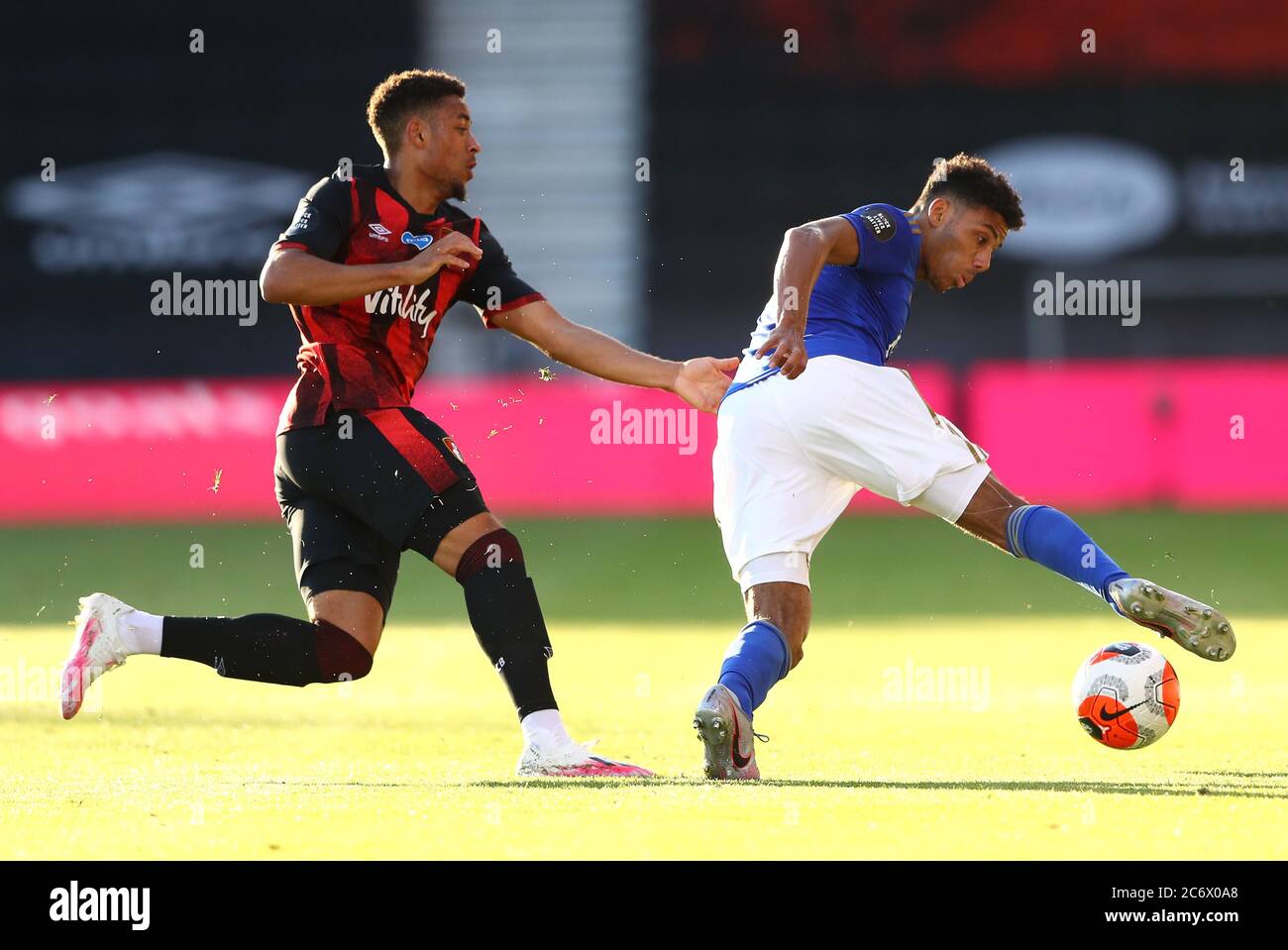 Bournemouth's Arnaut Danjuma (left) and Leicester City's James Justin battle for the ball during the Premier League match at The Vitality Stadium, Bournemouth. Stock Photo