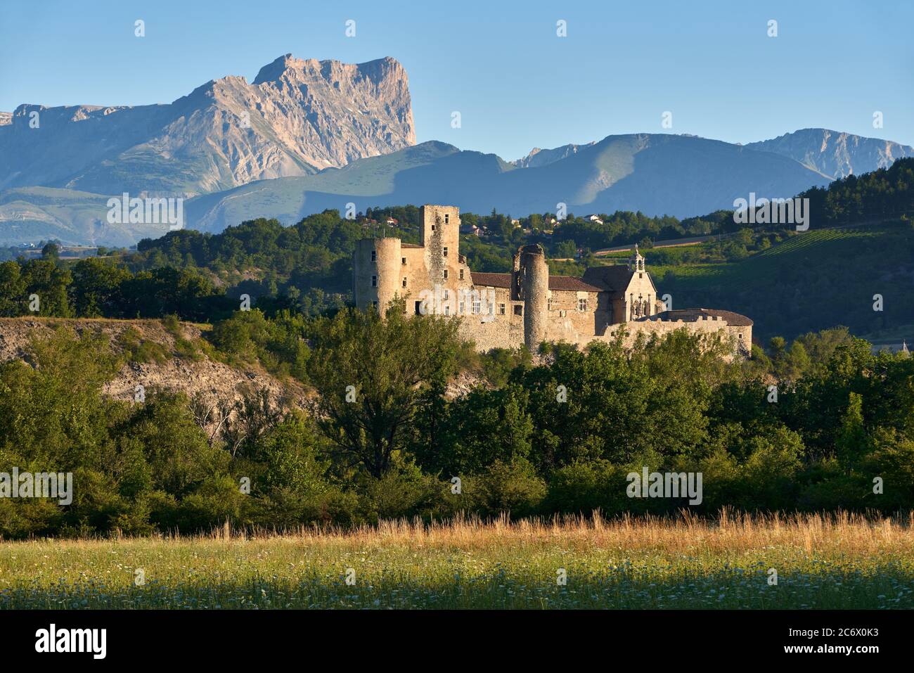 Tallard Castle (Medieval Historic Monument) in the Durance Valley with Bure Pic in the distance. Tallard, Hautes-Alpes (05), Alps, France Stock Photo