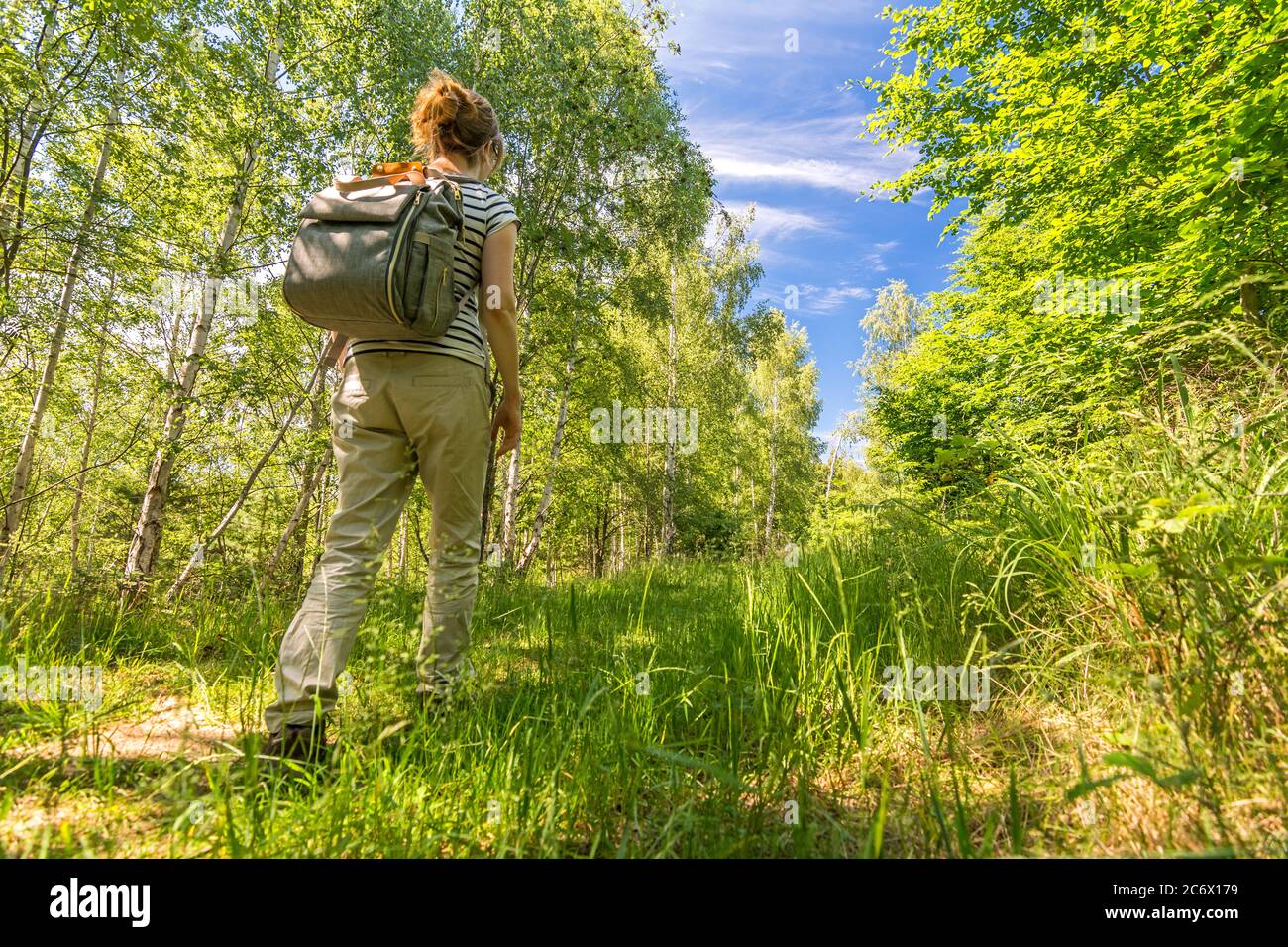 Female woman trekking forest hi-res stock photography and images - Alamy