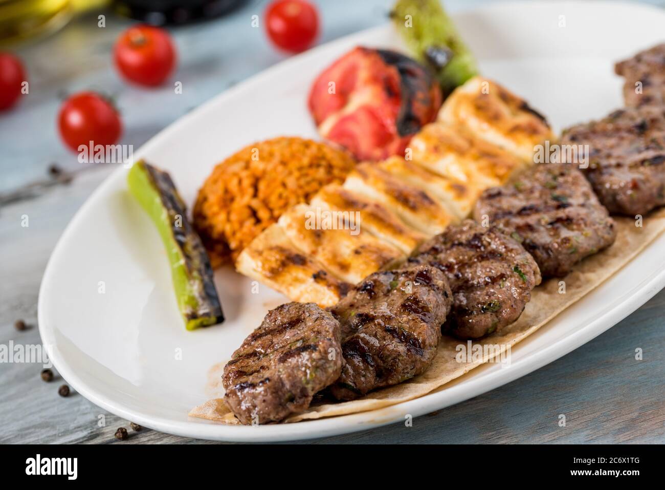 Turkish traditional kofte. Spicy meatballs Kebab or Kebap. Stock Photo