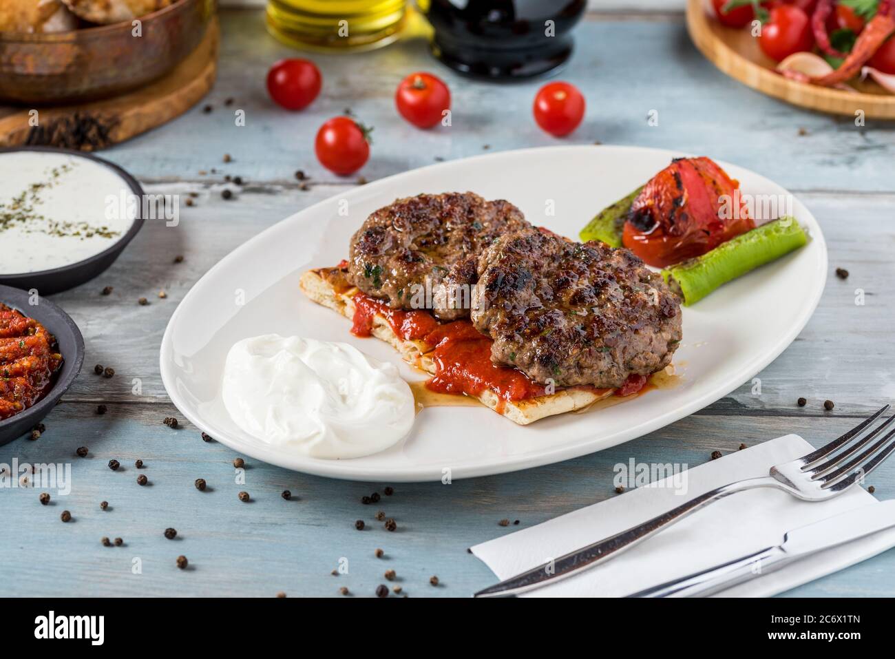 Turkish traditional kofte. Spicy meatballs Kebab or Kebap. Stock Photo