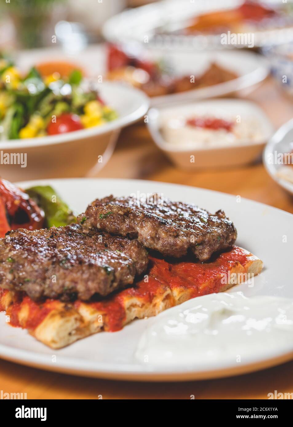 Turkish traditional kofte. Spicy meatballs Kebab or Kebap. Stock Photo