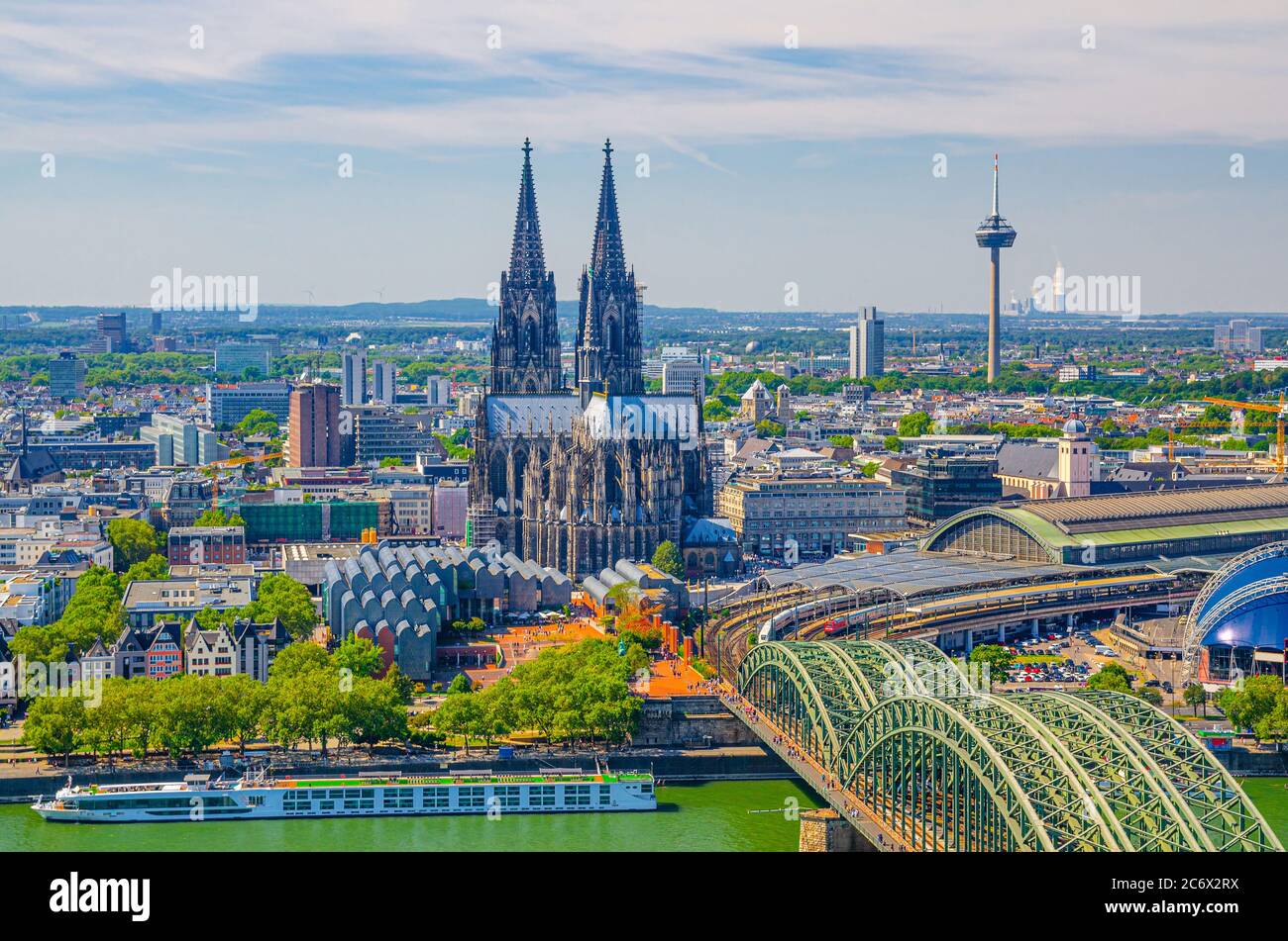 Aerial view of Cologne cityscape of historical city centre with Cologne Cathedral, central railway station Hauptbahnhof and Hohenzollern Bridge across Rhine river, North Rhine-Westphalia, Germany Stock Photo