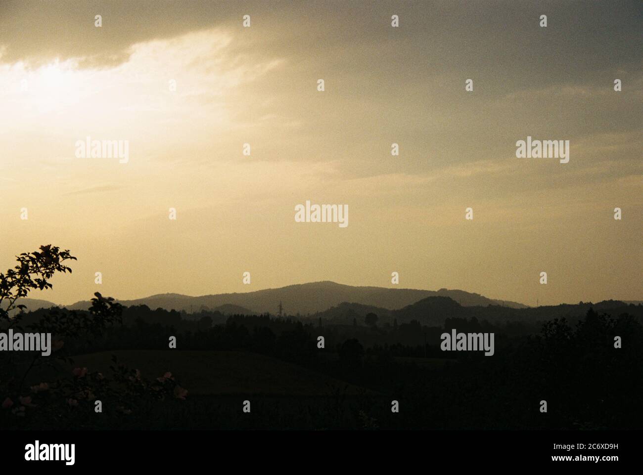 Landscape in silhouettes. Cloudy sky Stock Photo - Alamy