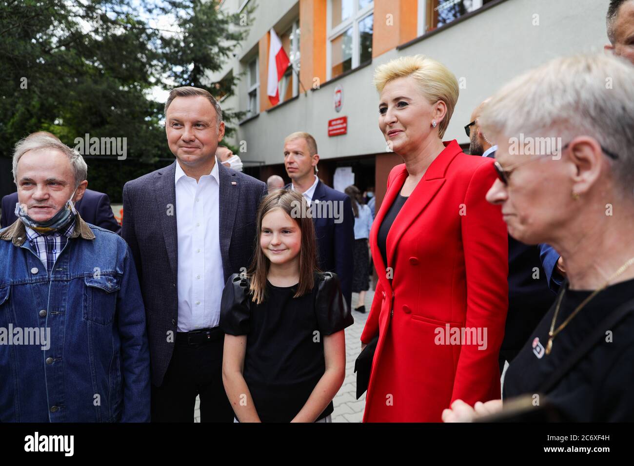 Polish presidential couple Andrzej Duda and Agata Kornhauser-Duda pose for a photo with their supporters after voting.  The incumbent President of Pol Stock Photo