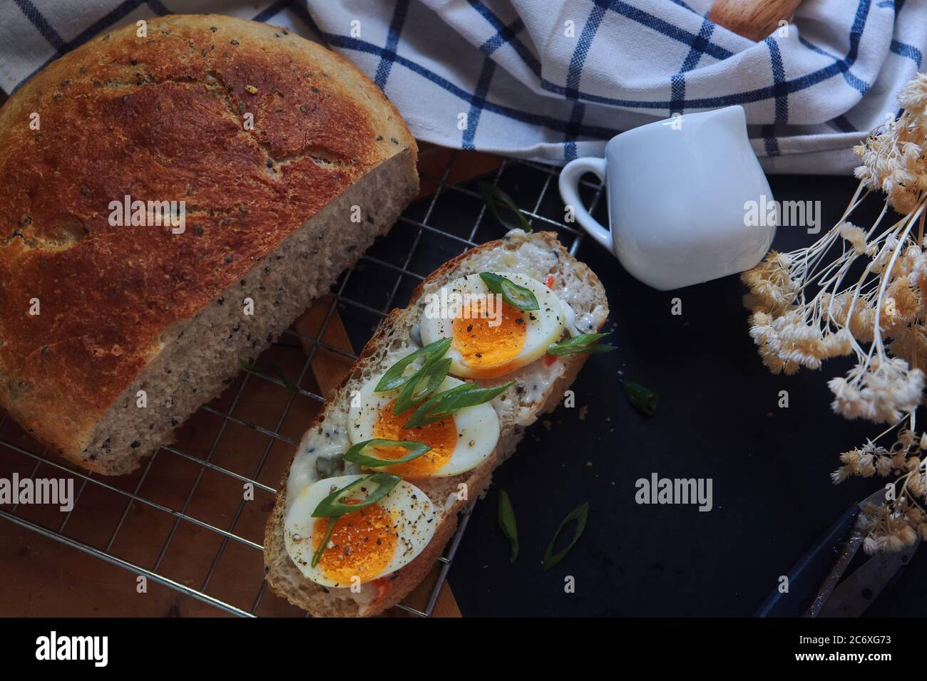 The Slice of sourdough bread with egg Stock Photo Alamy
