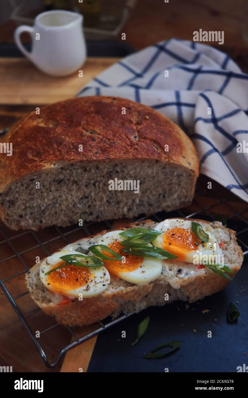 The Slice of sourdough bread with egg Stock Photo Alamy