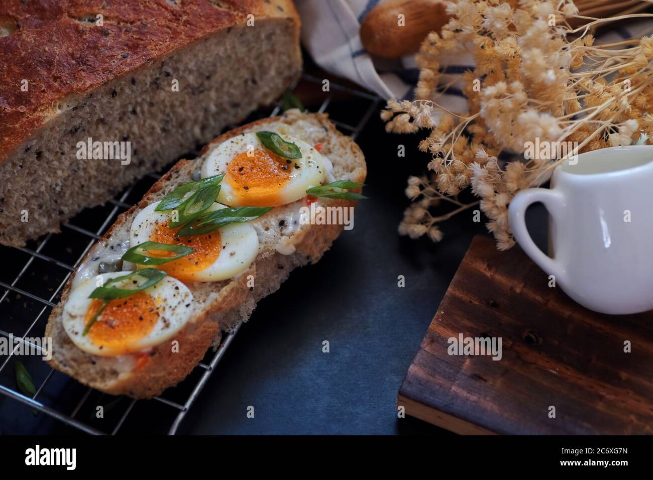 The Slice of sourdough bread with egg Stock Photo Alamy