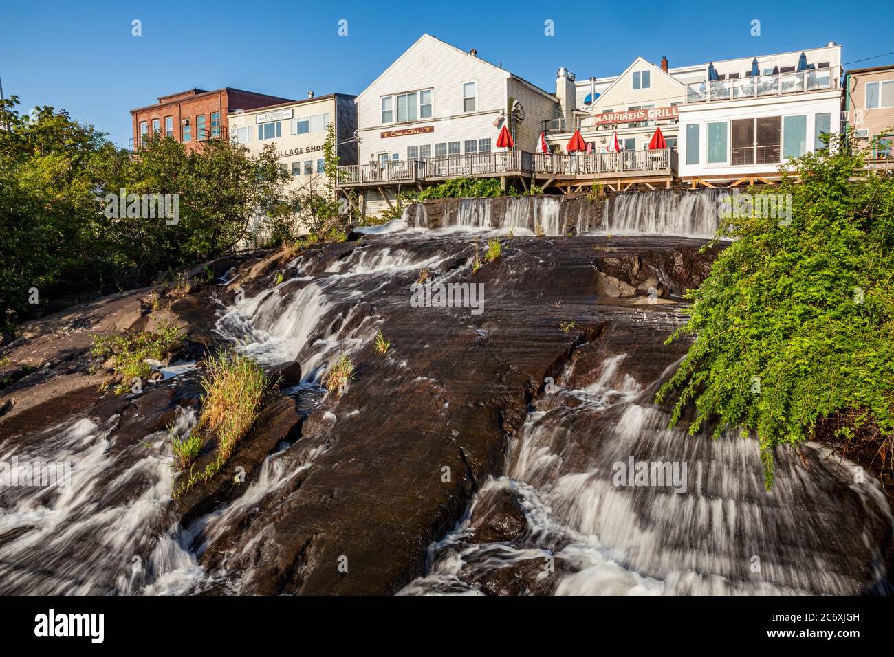 A waterfall flows right through the center of Camden, Maine into the