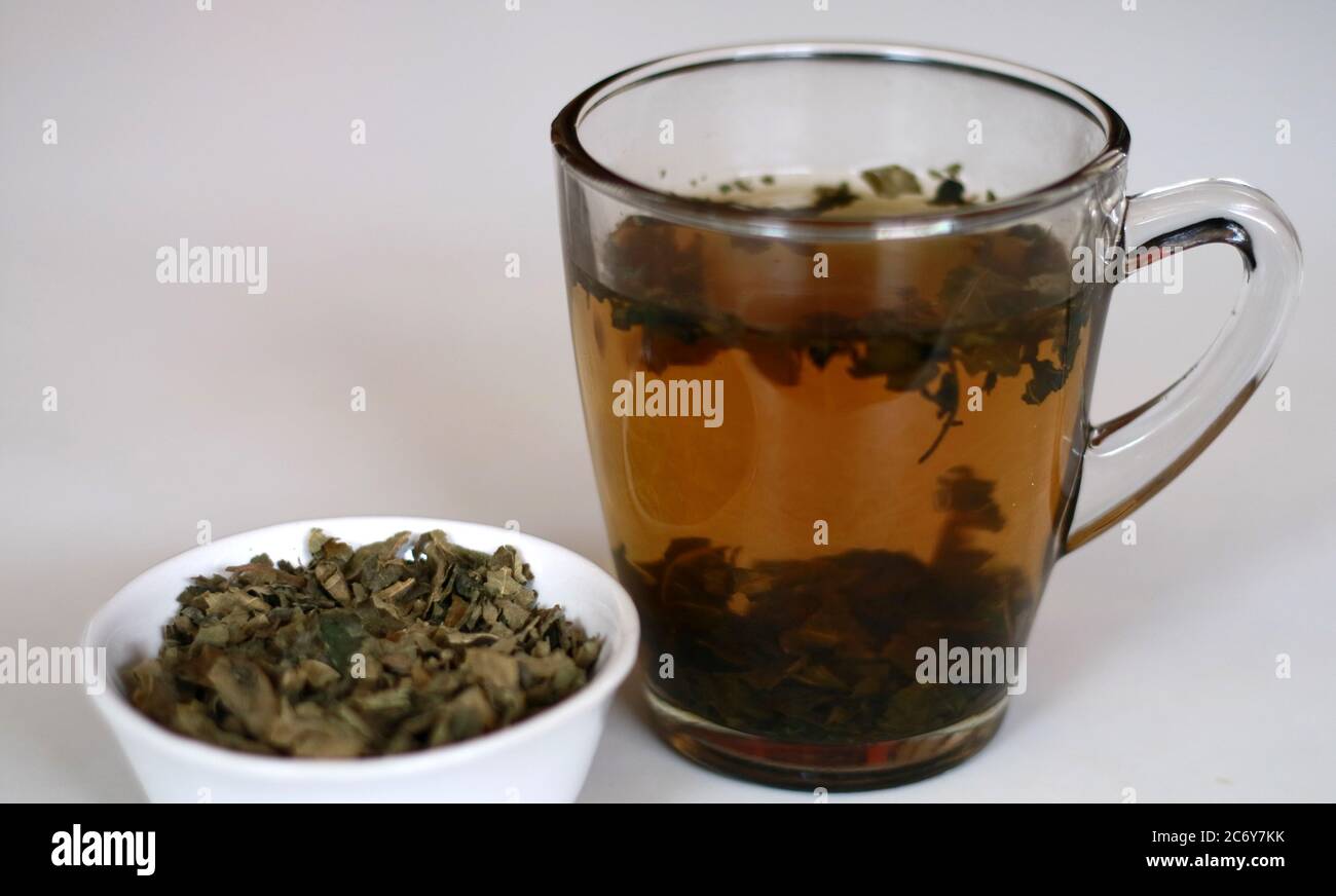 Fig leaf tea and a glass of drink. A great source of fiber and full of ...