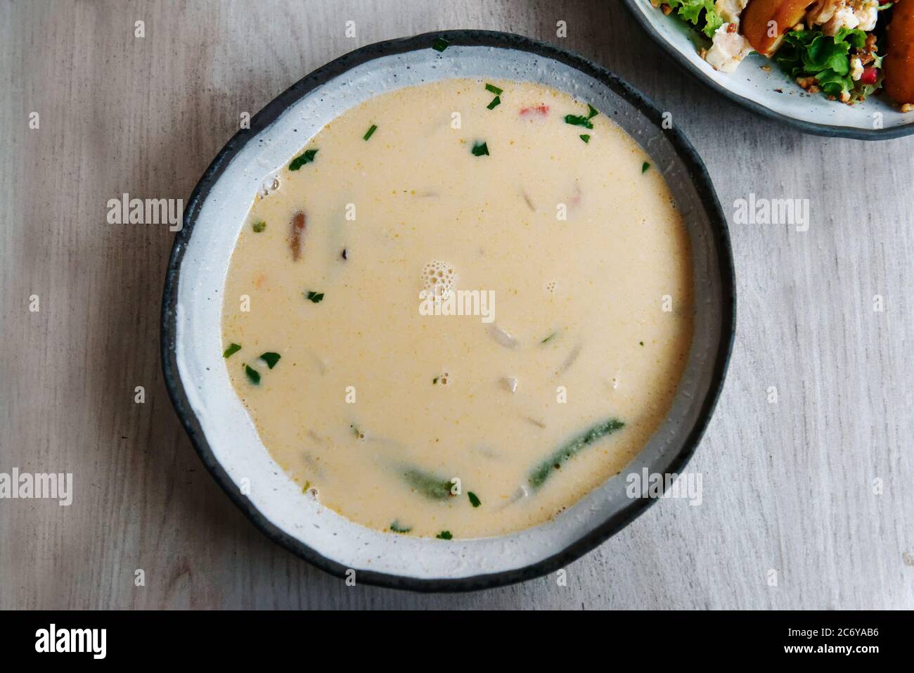 Thai soup with coconut milk Stock Photo - Alamy