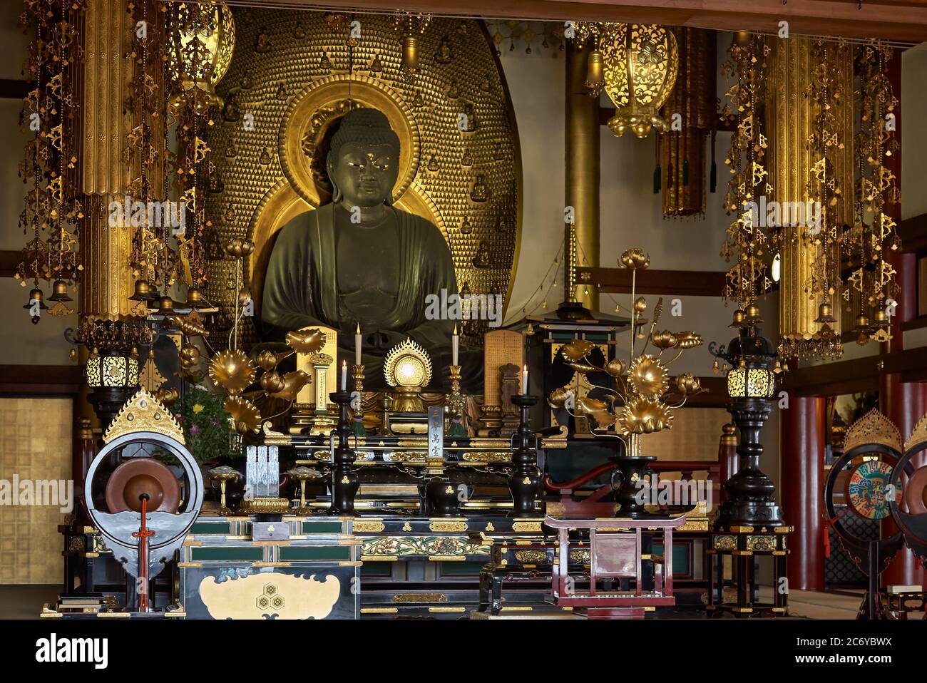 KYOTO, JAPAN - OCTOBER 22, 2007:  An impressive image of the Amida Nyorai, the Buddha of Limitless Light, sits upon a lotus pedestal within the  Seiga Stock Photo