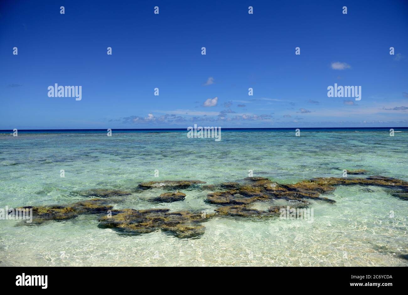 Blue sea and rock reef, clear tropical waters in the Mariana Islands