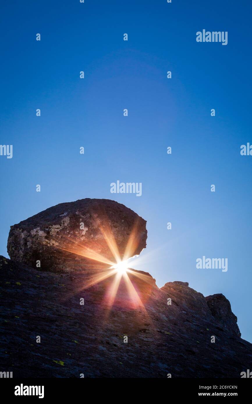 Sunburst through rocks at Mexiquillo, Durango, Mexico. Stock Photo