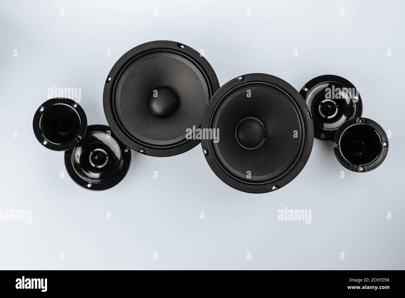 Car audio, car speakers, black subwoofer on a white background. Copy