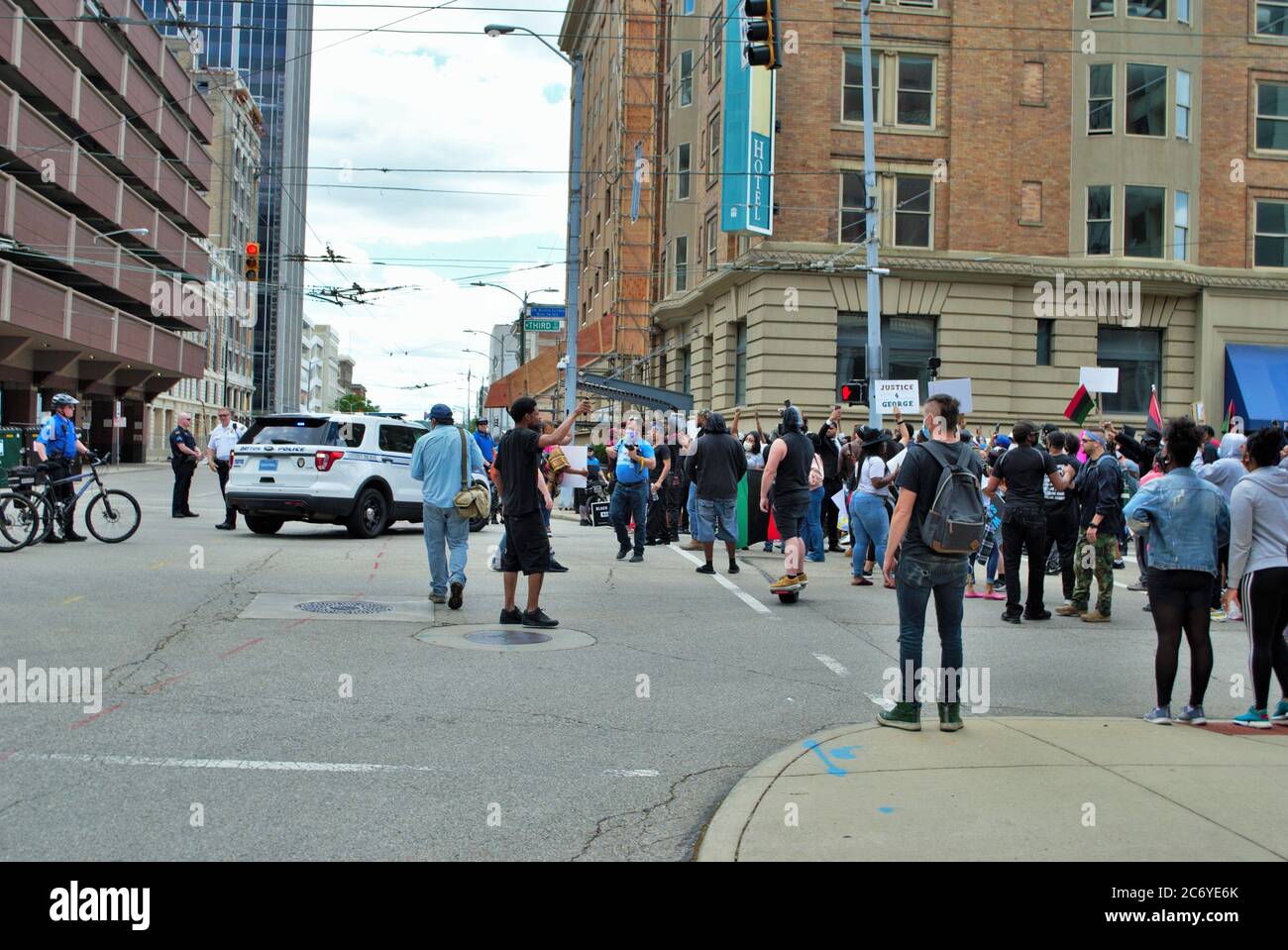 Dayton, Ohio, United States 05/30/2020 protesters at a black lives matter rally marching down the street holding signs and wearing masks Stock Photo