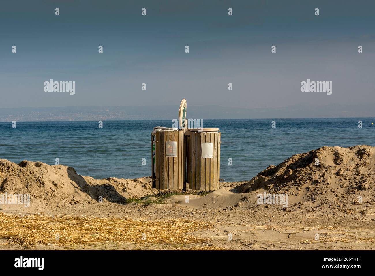 Trash on a beach, Lake Geneva, Haute Savoie, Auvergne Rhone Alpes. France Stock Photo