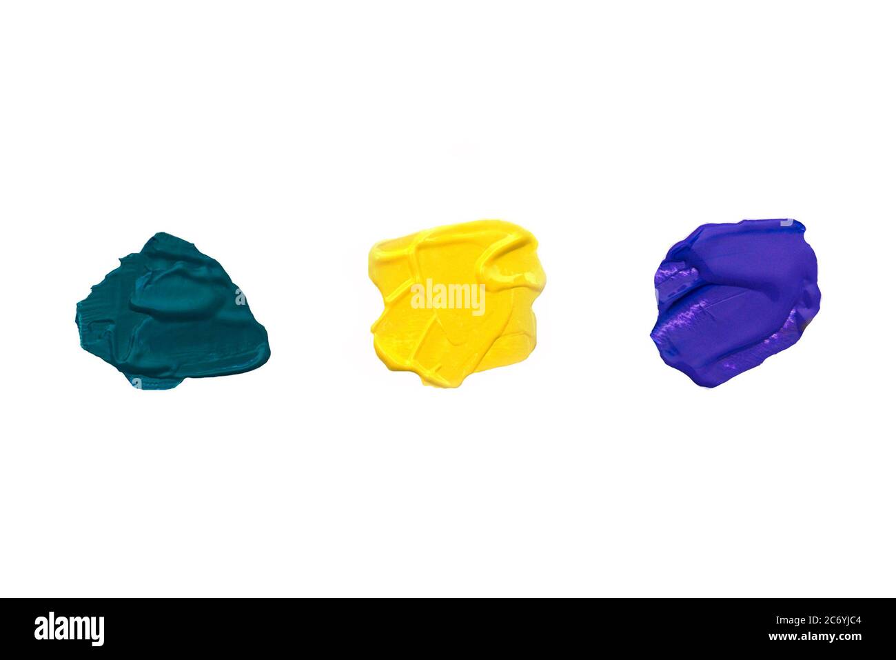 Multi-colored acrylic paint strokes on white background. Green, yellow, purple colors. Copy space. Stock Photo