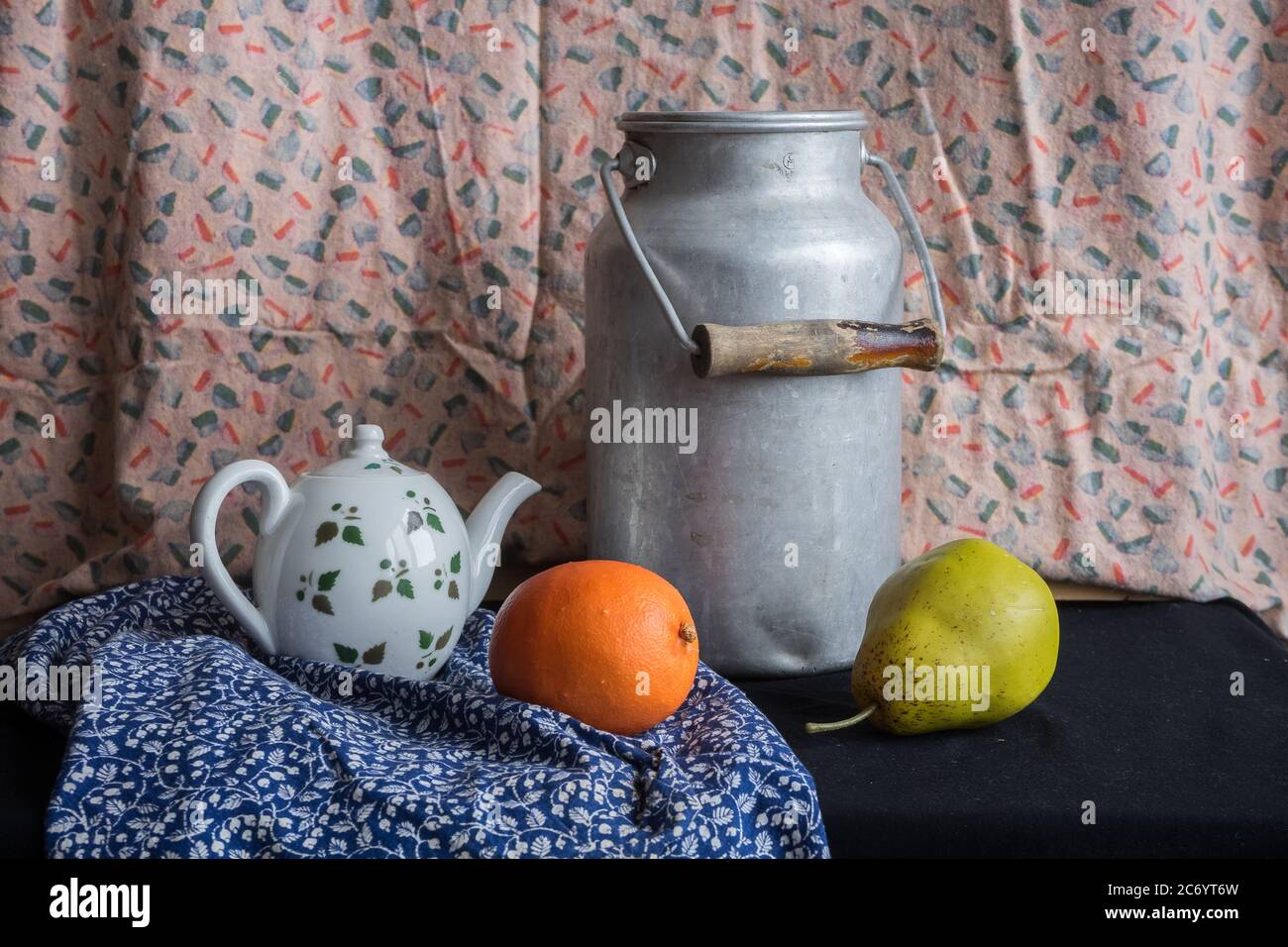 Still life with a milk can, teapot, pear and orange. russian painting style Stock Photo