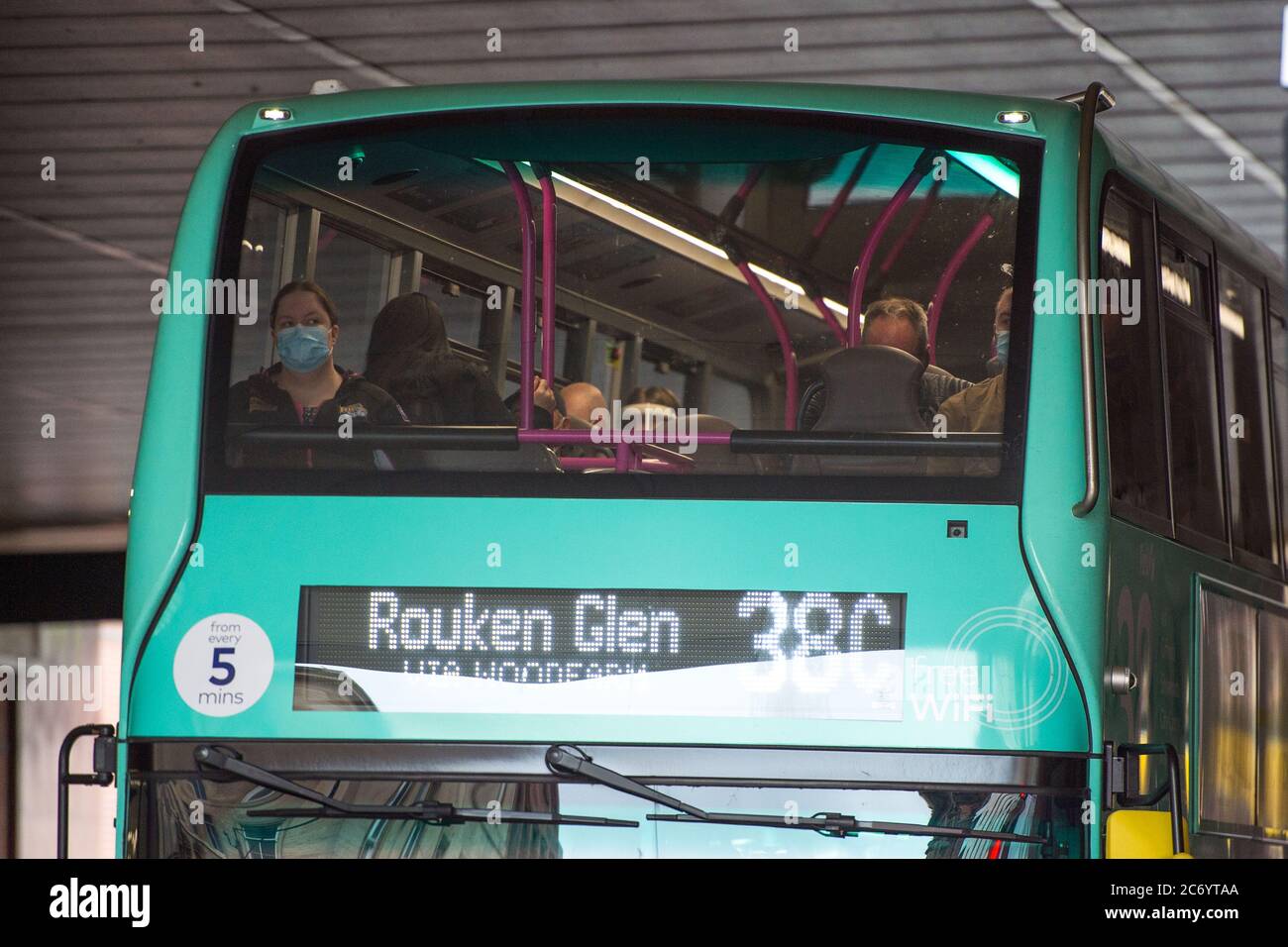 Glasgow Scotland, UK. 13th July, 2020. Pictured People wearing face coverings/face masks whilst