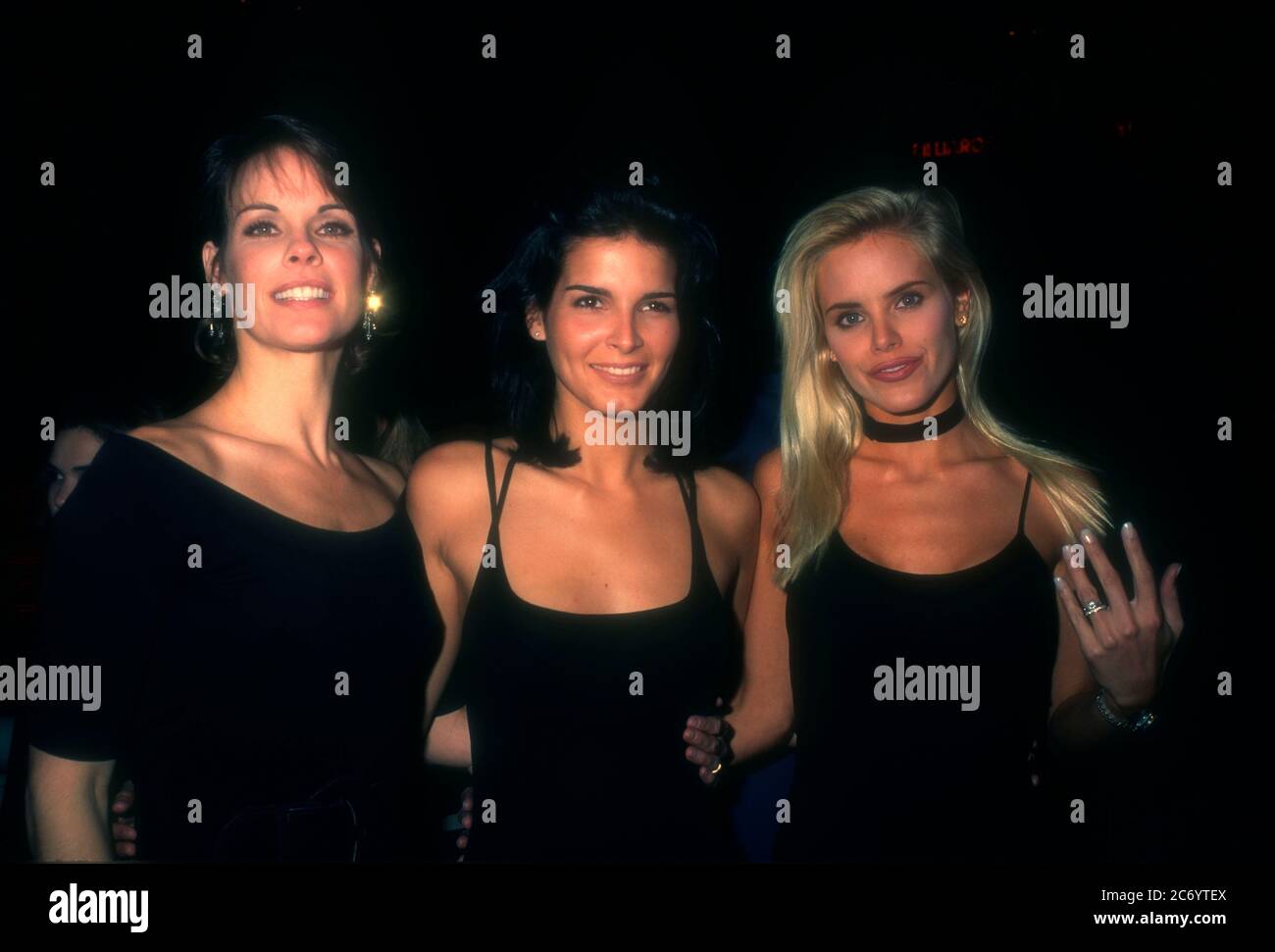 Universal City, California, USA 15th December 1995 (L-R) Actresses Alexandra Paul, Angie Harmon and Gena Lee Nolan attend Baywatch & Baywatch Nights Holiday Party on December 15, 1995 at B.B. King's Blues Club in Universal City, California, USA. Photo by Barry King/Alamy Stock Photo Stock Photo