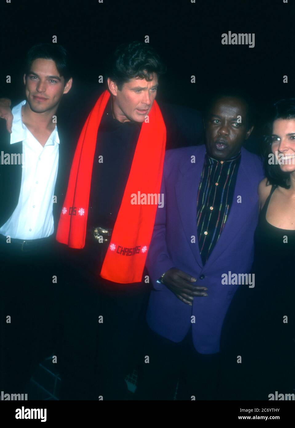Universal City, California, USA 15th December 1995 (L-R) Actor Eddie Cibrian, actor David Hasselhoff, singer Lou Rawls and actress Angie Harmon attend Baywatch & Baywatch Nights Holiday Party on December 15, 1995 at B.B. King's Blues Club in Universal City, California, USA. Photo by Barry King/Alamy Stock Photo Stock Photo