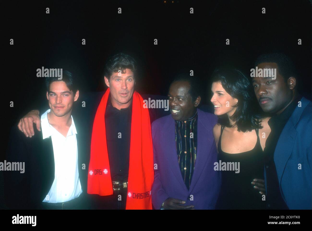 Universal City, California, USA 15th December 1995 (L-R) Actor Eddie Cibrian, actor David Hasselhoff, singer Lou Rawls, actress Angie Harmon and actor Gregory Alan Williams attend Baywatch & Baywatch Nights Holiday Party on December 15, 1995 at B.B. King's Blues Club in Universal City, California, USA. Photo by Barry King/Alamy Stock Photo Stock Photo