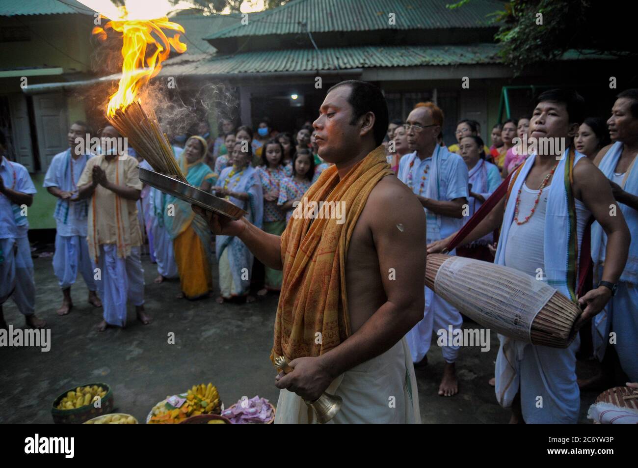 The annual Ratha Yatra is a ritual celebrated with much zeal and enthusiasm in the Temple precincts. The festival is a celebrated for almost a week, starting with the forward journey of the chariot and ending up wuth tge reverse homeward journey. This year, the journey of the deity is only bound within the yards of the Sri Sri Mohaprobhu Mondir, Sagordighir par, due to covid19 pandemic. Sylhet, Bangladesh. Stock Photo
