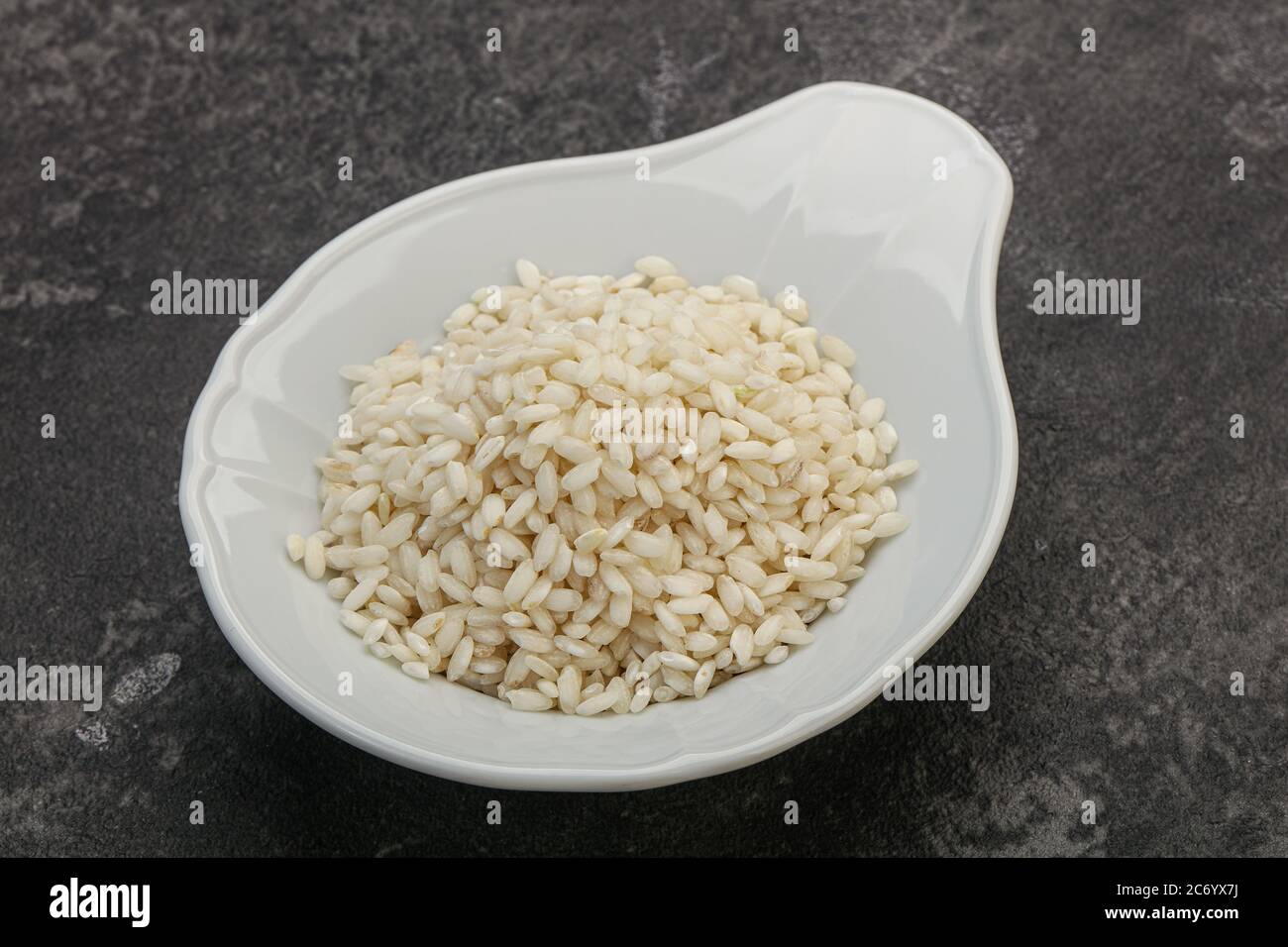 Raw Italian arborio rice for Risotto Stock Photo - Alamy